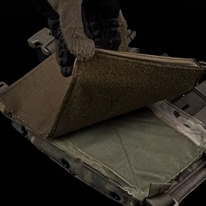 Aegis Drop-In Utility Organization Pouch integrated into a tactical gear loadout, showcasing secure attachment and accessible storage alongside other chest rig gear.